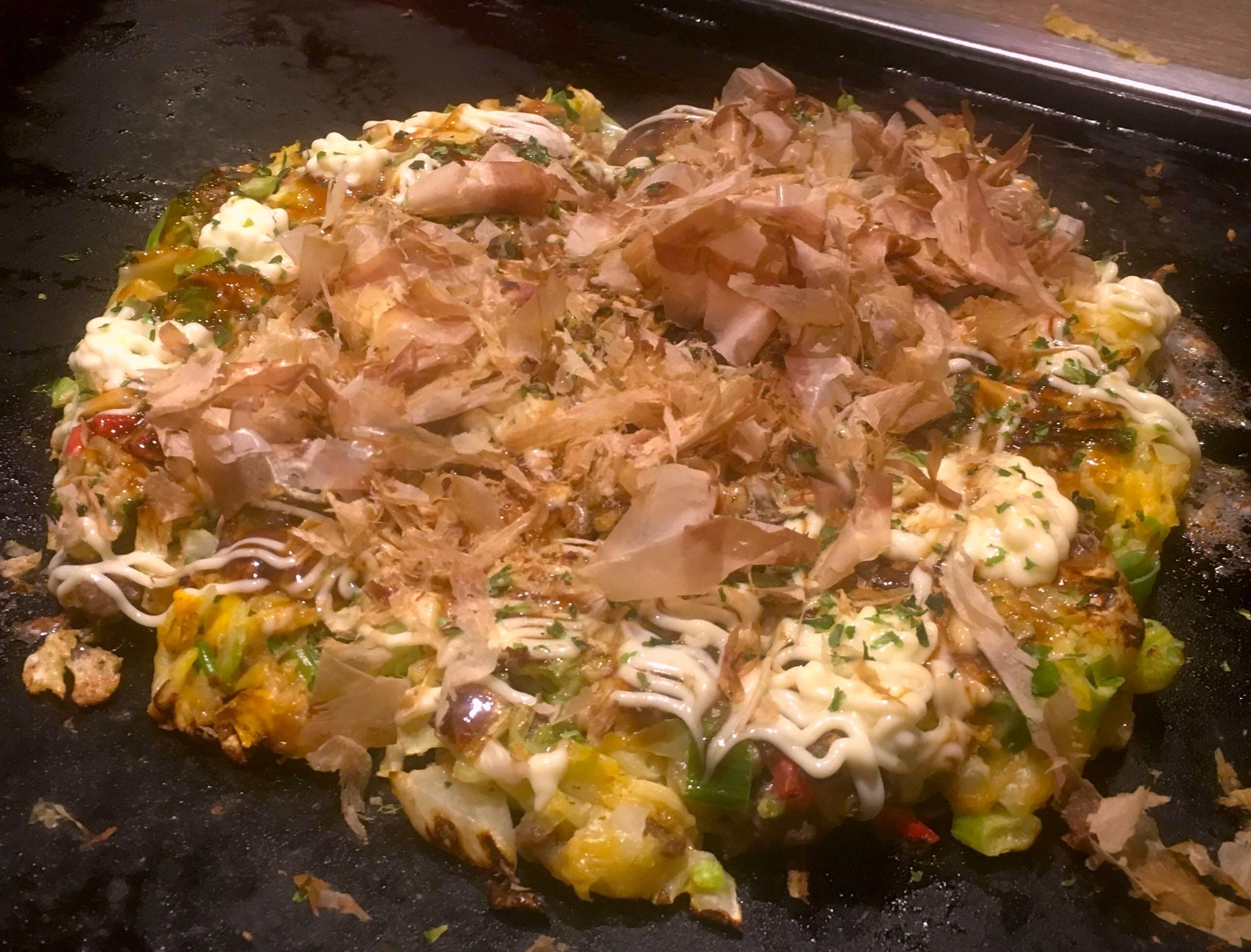 (Okonomiyaki originated in Osaka, Hiroshima. Learn how to make and cook this delicious dish in Izakayas.
