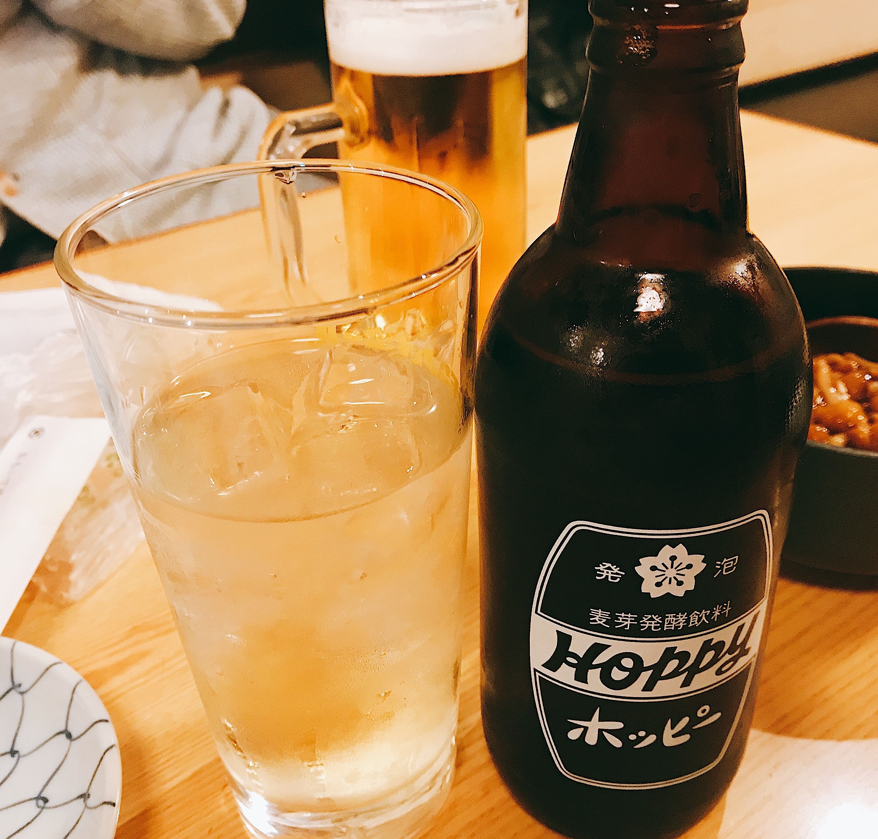 (A local drink of Tokyo, Hoppy. Drinking Hoppy combined with Shochu will leave you very refreshed.